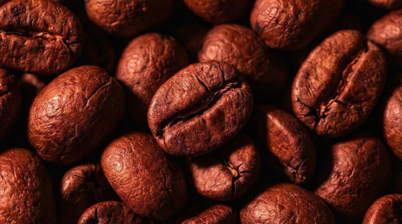 Woman holding Love Potion Colombia jar in front of her face revealing only her eyes in dramatic portrait lighting